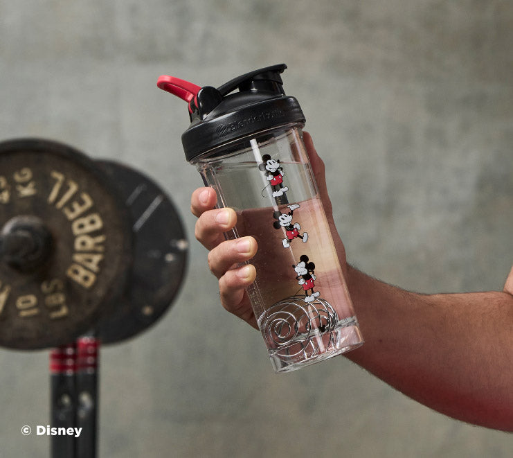 pro-series-a8 Mickey_Mouse_Protein_Shaker_Bottle_Being_Held_In_the_Gym.jpg